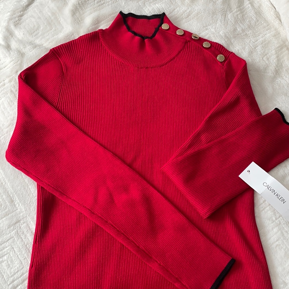 Calvin Klein mock sweater turtleneck. Ribbed with black trim and gold buttons.